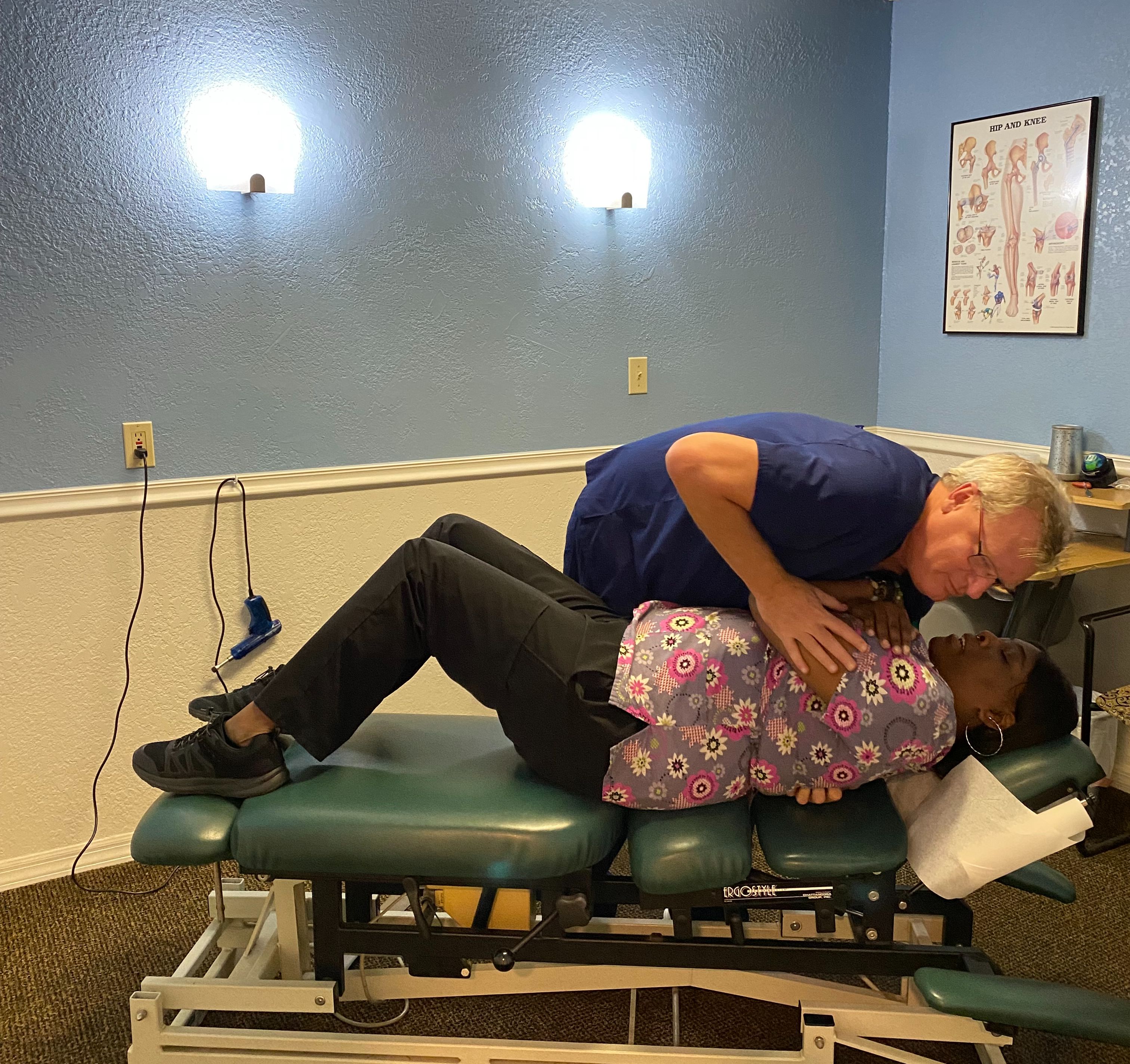 dr cymanski doing a Chiropractic adjustment
